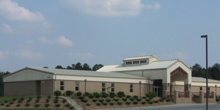 Image of The Adult Education and Nursing Complex is located on the east side of the Melbourne campus. It was built in 2000 and houses the Licensed Practical Nursing program and the Adult Basic Education programs. The south side of the building hosts classrooms and a computer lab where students learn educational foundation coursework, often in order to take the GED exam. The north side of the building hosts the nursing program, including a student nursing skills laboratory and a small computer lab. In the center of the building is a student lounge area.